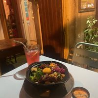 Bibimbap and pink lemonade  at O Gambuzino in Lisbon
