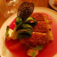 Tofu Katsu.  Marinated in Açorean black tea, panko-battered with a brandy & black tea reduction, Portuguese quinoa with nuts, pak-choy, grapefruit, purple cabbage & orange juice. at O Gambuzino in Lisbon