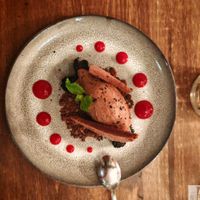 Belgian chocolate mousse, baked cocoa meringue, chocolate crumb and blackberries. at O Gambuzino in Lisbon