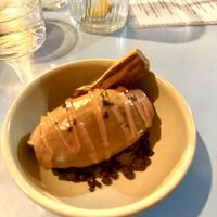 Belgium chocolate mousse, baked cacao, meringue, chocolate crumb, pomegranate.  at O Gambuzino in Lisbon
