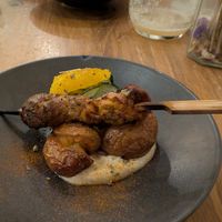 'Lamb' skewer on roasted potatoes at O Gambuzino in Lisbon