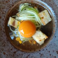 Corn consomme with "egg yolk" at O Gambuzino in Lisbon