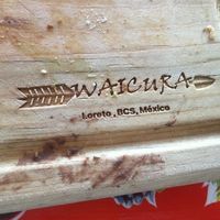 They serve their food on these wooden platters. Good, no plastic waste! at Waicura in Loreto