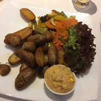Rosemary roasted potatoes, wok vegetables + chickpea-pepper-dip at Schröders at Kurhaus am Inselsee in Guestrow