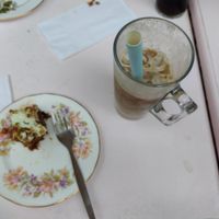 Almond milk iced  coffee and vegan carrot cake at Lion Rock Tea Rooms in Cheddar