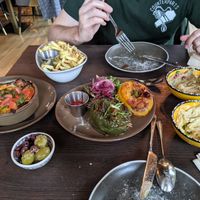 Vegan mousakka, stuffed peppers, fries, and olives at BAAB in Oban