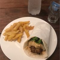 Vegan souvlaki wrap with humous & chips  at Elia Greek Kitchen in Siem Reap