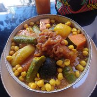 Couscous. Comes with couscous on the bottom and some chickpeas for protein. Also has carrots eggplant and a few other vegetables I can't identify at Broc The Kasbah in Marrakech