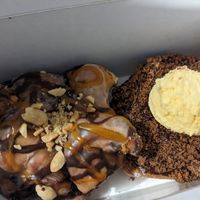 Snickers fritter and Nanaimo donut at Machino Donuts - Bloor St in Toronto
