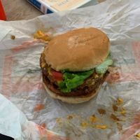Iconic burger with extra patty. Delicious   at Plant Power Fast Food - SDSU in San Diego