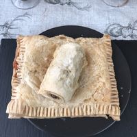 Vegan sausage roll on top of sausage, beans and cheese pasty at The Roundhouse Cafe in Wolverhampton