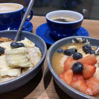 Left: Holy crunch Granola / right: fresh fruit with homemade apple sauce at Haferkater - S-Bf Friedrichstraße in Berlin
