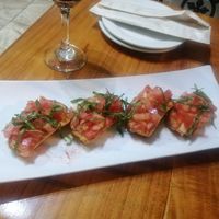 Bruschette pomodoro e basilico at L'Angolo in Quepos