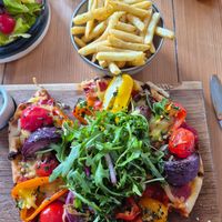 Fresh veg and salad on a great pizza. at The Duck in Ryde