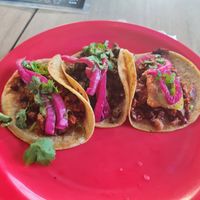 Pastor, green chorizo, chicharron at El Bajón Vegano in Tulum