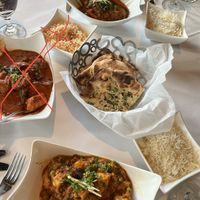 X’s mark not vegan. Got the garlic naan made without butter. Top: tikka masala. Bottom: aloo gobi  at 21 Spices in Naples