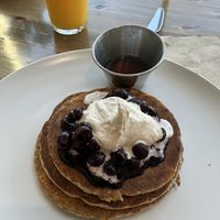 J'S PANCAKES 
VANILLA CARDAMOM MAPLE. BLUEBERRIES. COCONUT GINGER WHIPPED CREAM.  at Harvest on 25th in Waco