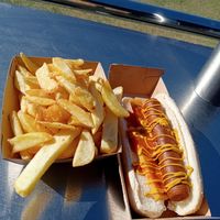 Vegan hot dog with a side serving of chips at Smelly Cheese Shop in Pokolbin
