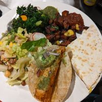 Avocado salad, greens, sweet potato, a taco and a quesadilla (takeaway assembled at home) at Wahaca in Brighton