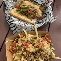 Cheesesteak sandwich and fries at SunLight Lounge in Amsterdam