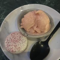 Orange ice cream and a macaron at Rozey in Rotterdam