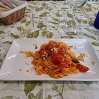 Tagliatelle di mais con pomodorini, capperi e mandorle at Locanda Reloup in Isasca