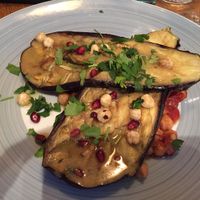 Aubergine - aubergine filled with with tahini, chickpeas, pomegranate and fresh coriander and hazelnutShort description at Paisan in Hilversum
