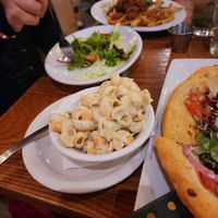 Mac salad and vegan side salad with green goddess and not pictured is a vegan garbage plate at The Gate House in Rochester
