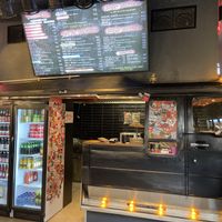 Cool inside of the restaurant with a van! at Beastie Burgers in Antwerpen