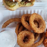 Chicken sandwich onion rings and sweet potato tots 😋 at Daily Veg in Wilmington