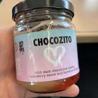Chocozito - a Dessert with dark chocolate cream, faspberry sauce and brownie dough, here as to go option  at Vegan Junk Food Bar  - Rotterdam in Rotterdam