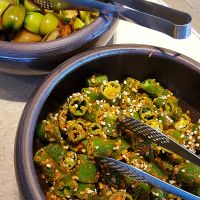  Green peppers in fermented bean paste (doenjang 된장) and pickled tomatoes are vegan. at HanCook - 한쿡 in Seoul