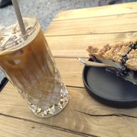 Vegan ice coffee and vegan blauberry cake at Kaffehus in Gottingen