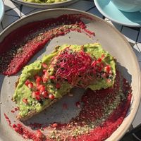 Vegan country bread with avocado, pomegranate and beet hummus. at Mit Herz und Zucker in Hamburg