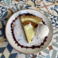 Lemon tart with almond ice cream 🍰  at MIMO in Malaga