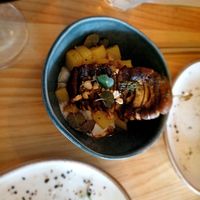 Tapa of potatoes with cashew sauce and mushroom scewer at MIMO in Malaga
