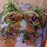 Burrito Verde (swiss chard, dried tomato-walnut "meat", cauliflower rice, fermented red cabbage, avocado, "cheese" sauce) at MIMO in Malaga