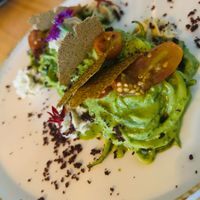 RAW Zucchetti - with a chard pesto, confit tomatoes, vegan ricotta and kalamata powder 👌 at MIMO in Malaga
