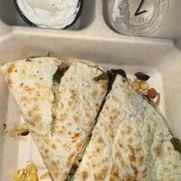 Quesadilla with mushrooms and vegan sori cream   at Mad Mex in Pittsburgh