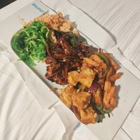 Black bean tofu, fried rainbow rice, seaweed + edamame, satay tofu and salt + chilli chips at Suissi Vegan Kitchen  in Glasgow