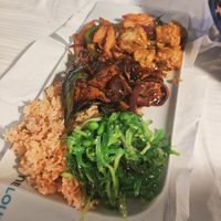 Black bean tofu, fried rainbow rice, seaweed + edamame, satay tofu and salt + chilli chips at Suissi Vegan Kitchen  in Glasgow