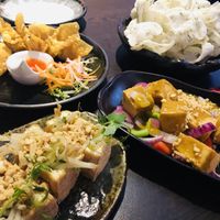 Wontons, vegan crackers, satay tofu and tofu parcels  at Suissi Vegan Kitchen  in Glasgow