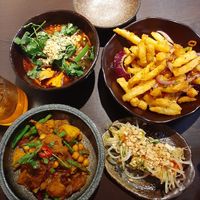 Sczechuan tofu, rendang curry, salt & chilli chips & tofu parcels at Suissi Vegan Kitchen  in Glasgow
