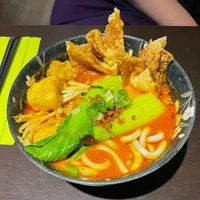 Laksa curry with udon noodles at Suissi Vegan Kitchen  in Glasgow
