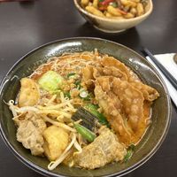curry laksa rama + salt & chilli chips  at Suissi Vegan Kitchen  in Glasgow