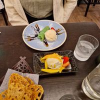 From top to bottom: Coconut pancake with vanilla ice cream; Mango and passionfruit ice cream. at Suissi Vegan Kitchen  in Glasgow