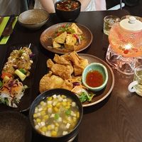 Hot sour soup, sweetcorn soup, Satay tofu skewers, salt chilli tofu, fried wontons and chrysanthemum goji berry tea at Suissi Vegan Kitchen  in Glasgow