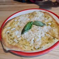 Vegan garlic pizza bread, cheese was nice and melted well at Frankie & Benny's - Fort Shopping in Glasgow