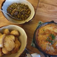 Lemon+oregano potatoes ($9.5), Baked broad beans + pea salad ($9.50), Mousaka ($29.50) at Philhellene in Moonee Ponds