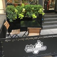 Outdoor seating at Juice Generation - Astor Place in New York City